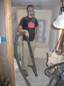 Jason sanding drywall mud