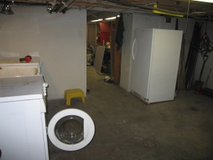 Basement Laundry Room looking to workshop